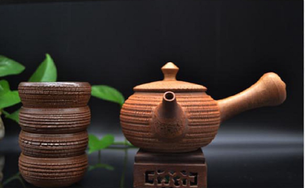 定瓷茶器：擺放在茶臺上的大宋定窯手工裂變壺，重溫唐風(fēng)，再現(xiàn)歷史的美妙感